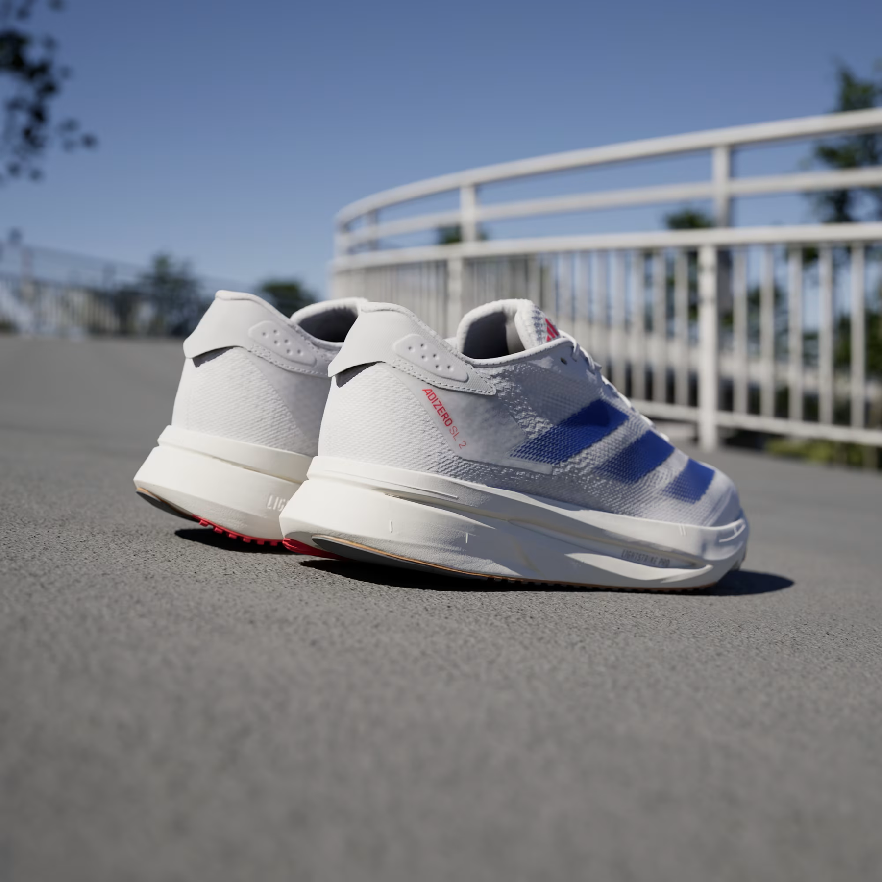 CORRIDA ADIZERO SL2 WHITE BLUE–Exclusivo